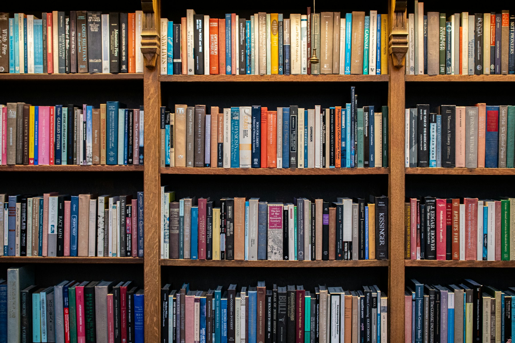 Books arranged on library shelves
